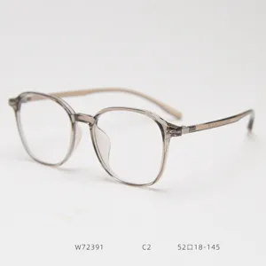 Vista detallada de gafas TR90 transparentes, montura óptica gris de moda para uso diario.