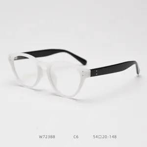 Retro cat-eye TR90 optical glasses frame with white front and black temples detail.