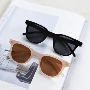 Unisex TR90 polarized sunglasses set featuring classic black and light khaki frames for daily wear.