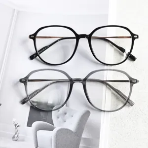 Detailed view of the stylish TR90 thin rimless optical glasses frames in classic black and grey.