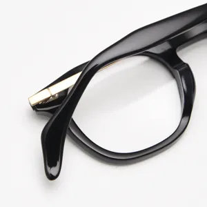 Detailed view of stylish black acetate optical eyeglass frame with metallic temple accent.