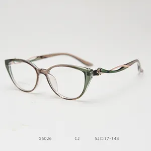 Fashion cat-eye eyeglass frame, gradient green and brown optical glasses for women, stylish clear lenses.