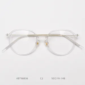 Transparent frame optical glasses with gold metal temples, stylish round myopia frame.