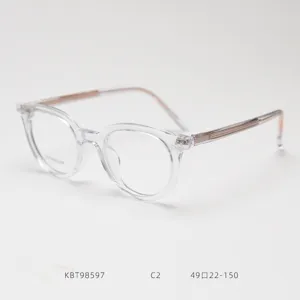 Detailed view of the clear acetate and metal optical eyeglasses frame, lightweight retro style.