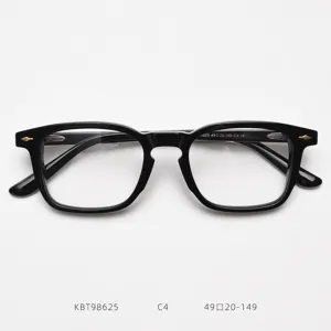 Classic black vintage optical glasses frame with gold rivets, premium acetate material.