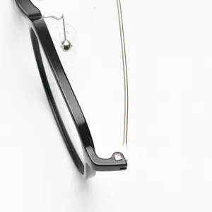 Detailed closeup of Korean style thin rim TR90 optical glasses frame with metal temples.
