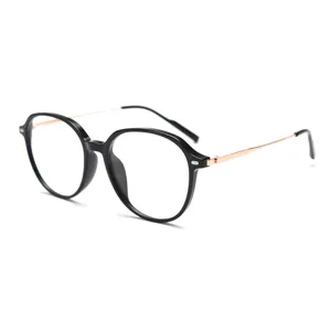 Classic black frame optical glasses with slim rose gold metal temples for daily wear.