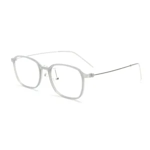 Korean style transparent grey TR90 optical glasses frame with thin metal temples, front view.
