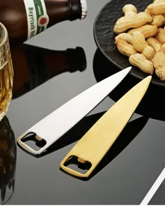 Stainless steel bottle opener detail shot, elegant silver and gold wedge design bar tool.