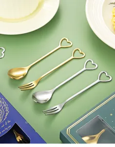 Stainless steel heart-shaped coffee spoon and fruit fork detail view, elegant gift tableware set.