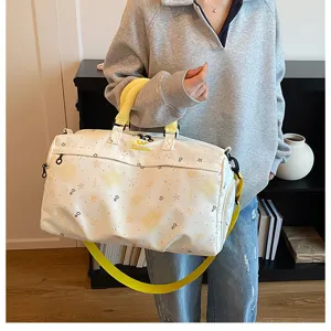 Large capacity travel duffel bag for women, stylish gym shoulder bag and lightweight luggage.