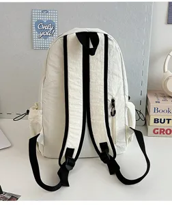 White casual large capacity backpack back view, lightweight student school bag daily commute.