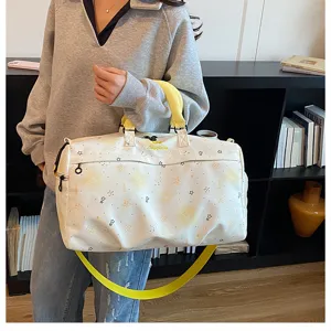 Large capacity travel duffel bag with yellow straps, stylish lightweight gym and flight bag for women