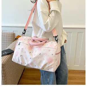 Large capacity pink travel duffel bag with cute star pattern, lightweight gym sports luggage.