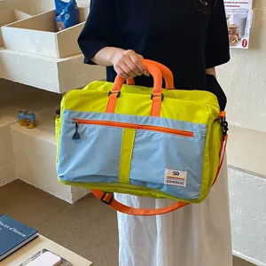 Color-block large capacity travel duffel bag, portable gym bag for weekend trips and daily commute.
