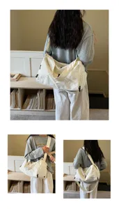 Sac de voyage en toile detail montrant grande capacite, sangle ajustable et style.