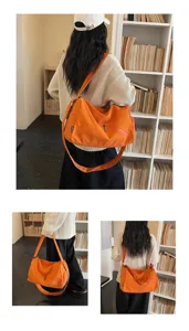 Sac de voyage bandouliere en toile orange, grande capacite sac bandouliere quotidien.