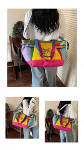 Detailed view of the stylish color-block canvas tote bag, showing large capacity and design.