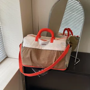 Large capacity travel duffle bag for women and men, lightweight weekend overnight bag with strap.