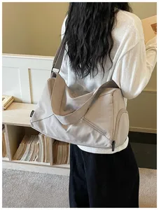 Grand sac de sport de voyage pour femme avec séparation humide et sèche pour le fitness.
