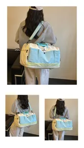 Detailed view of the large capacity canvas travel duffel bag with multi-pocket design.