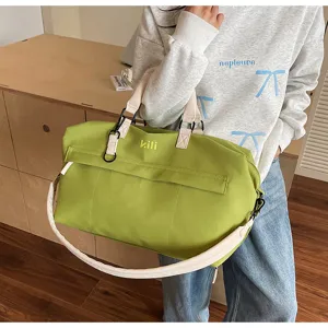 Large capacity green travel duffel bag with white straps for men and women gym sports.
