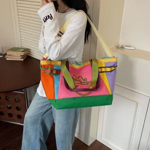 Large capacity color block canvas tote bag, casual shoulder travel bag for daily commute.