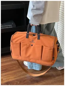Large capacity travel duffel bag for women and men, stylish weekender bag and gym sports bag.
