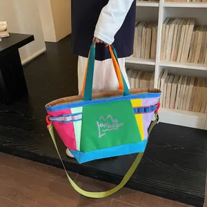 Large capacity color-block canvas tote bag, casual shoulder travel bag for daily commute.