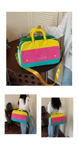 Dopamine color-blocked travel bag for women, large capacity shoulder and handbag for short trips.