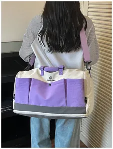 Large capacity travel duffel bag, waterproof gym bag for women, purple canvas weekend bag.