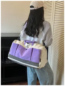 Large capacity travel duffel bag detail, casual canvas fitness sports bag for women.