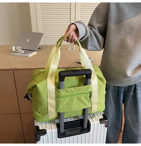 Gran bolsa de viaje para mujer, bolso ligero de lona con funda para maleta y deporte.