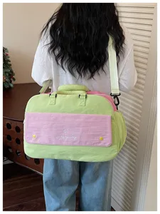 Colorblock travel duffel bag for women, large capacity lightweight gym yoga luggage.