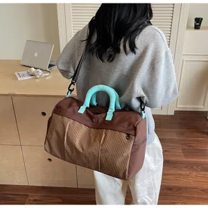 Grand sac de voyage étanche avec séparation humide et sèche pour le sport et la salle de gym.