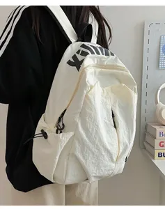 Lightweight water-repellent campus backpack with large capacity for travel and daily use.