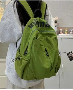 Casual green waterproof backpack for daily school travel, college and outdoor sports use.