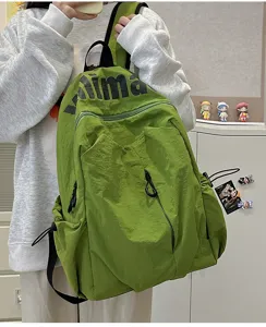 Casual green large capacity backpack for daily travel, school and outdoor sports use.