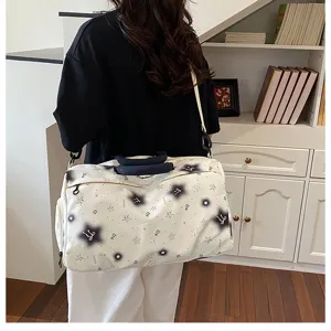 Large capacity travel duffel bag lightweight gym shoulder bag for women on short trips.