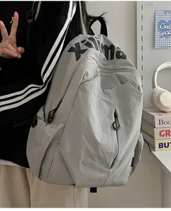 Casual light gray travel backpack for students, large capacity outdoor sports daily book bag