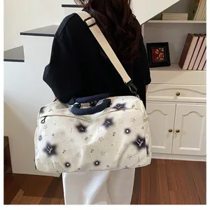 Large capacity travel duffel bag for women, fashion shoulder weekender bag for gym and sports.