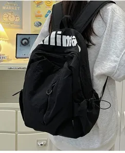 Detail view of the black minimalist waterproof casual backpack, perfect for daily outdoor travel.