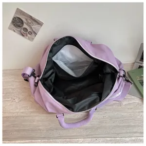 Large capacity purple travel duffel bag, sports gym bag with shoulder strap for women.