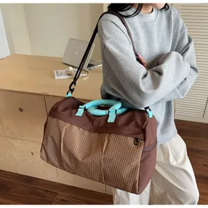 Grand sac de voyage étanche pour homme et femme, sac de sport fitness léger et grande capacité.