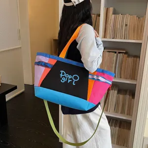 Large capacity color-blocked canvas shoulder tote bag for travel, daily commute and outdoor use.