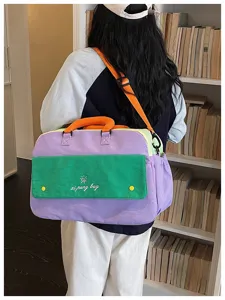 Colorblock travel duffel bag for women, large capacity casual shoulder gym bag for daily use.
