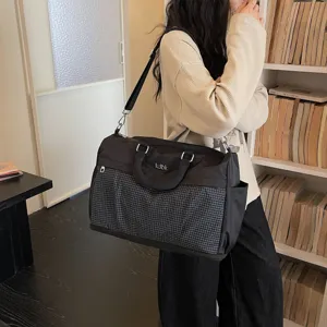Large capacity travel duffel bag with black plaid front pocket, lightweight gym and sports bag.