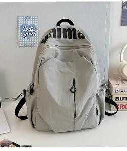 Lightweight waterproof large capacity grey casual backpack detail showcase for travel.