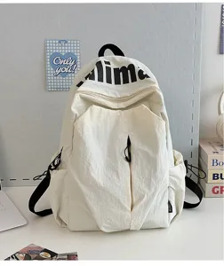 Lightweight water repellent canvas backpack for students, large capacity casual daypack travel bag.