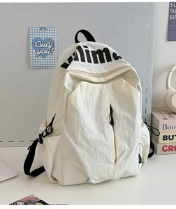 Minimalist white canvas backpack, lightweight water-repellent large capacity daily travel bag.